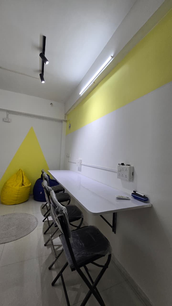 Desk with folding chairs